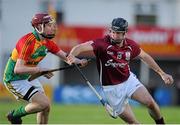 27 January 2013; Aengus Callinan, Galway, in action against Alan Corcoran, Carlow. Bord na M—na Walsh Cup, Second Round, Carlow v Galway, Dr. Cullen Park, Carlow. Picture credit: Dáire Brennan / SPORTSFILE