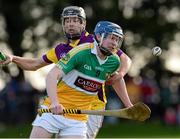 27 January 2013; Dermot Mooney, Offaly, in action against James Tonks, Wexford. Bórd na Móna Walsh Cup, Second Round, Wexford v Offaly, Wexford v Offaly, Pairc Naomh Brid, Blackwater GAA Club, Co. Wexford. Picture credit: Ray McManus / SPORTSFILE