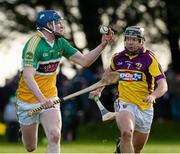 27 January 2013; Dermot Mooney, Offaly, in action against James Tonks, Wexford. Bórd na Móna Walsh Cup, Second Round, Wexford v Offaly, Wexford v Offaly, Pairc Naomh Brid, Blackwater GAA Club, Co. Wexford. Picture credit: Ray McManus / SPORTSFILE