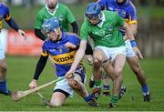 27 January 2013; Johnny Ryan, Tipperary, in action against Gavin O'Mahony, Limerick. Waterford Crystal Cup Quarter-Final, Tipperary v Limerick, McDonagh Park, Nenagh, Co. Tipperary. Picture credit: Diarmuid Greene / SPORTSFILE