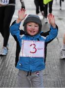 27 January 2013; Gavin McDonnell, Baldoyle, Co. Dublin, celebrating his third birthday, running in the AXA Raheny 5 Mile Road Race 2013. Raheny, Dublin. Picture credit: Tomas Greally / SPORTSFILE