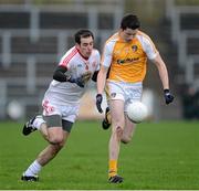 13 January 2013; Sean McCarron, Antrim, in action against Plunkett Kane, Tyrone. Power NI Dr. McKenna Cup, Section C, Round 2, Antrim v Tyrone, Casement Park, Belfast, Co. Antrim. Picture credit: Oliver McVeigh / SPORTSFILE