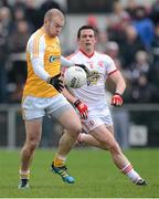 13 January 2013; Sean McVeigh, Antrim, in action against Aidan McCrory, Tyrone. Power NI Dr. McKenna Cup, Section C, Round 2, Antrim v Tyrone, Casement Park, Belfast, Co. Antrim. Picture credit: Oliver McVeigh / SPORTSFILE