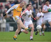 13 January 2013; Sean McVeigh, Antrim, in action against Aidan McCrory, Tyrone. Power NI Dr. McKenna Cup, Section C, Round 2, Antrim v Tyrone, Casement Park, Belfast, Co. Antrim. Picture credit: Oliver McVeigh / SPORTSFILE