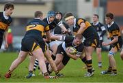 28 January 2013; Hugh O'Donnell, Newbridge College, with support from team-mate Conor Doyle, is tackled by Thomas O'Sullivan, left, and Graham Reynolds, right, The Kings Hospital. Powerade Leinster Schools Senior Cup, 1st Round, The Kings Hospital v Newbridge College, NUI Maynooth, Maynooth, Co. Kildare. Picture credit: Barry Cregg / SPORTSFILE