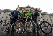 29 January 2013; Model Holly Carpenter with, from left, An Post Rás Organiser Tony Campbell, two time Rás winner Ciaran Power, county rider Brian Ahern, and An Post Chief Executive Donal Connell, at the launch of the 2013 An Post Rás which will begin on Sunday May 19th, in Dunboyne, and finish on Sunday May 26th, in Skerries. An Post Rás 2013 Launch, GPO, O'Connell Street, Dublin. Picture credit: Brian Lawless / SPORTSFILE