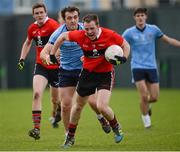 29 January 2013; Dan O'Sullivan, UCC, in action against Emmett McGuckian, UUJ. Irish Daily Mail Sigerson Cup, Round 1, UCC v UUJ, Parnells GAA Club, Coolock, Dublin. Picture credit: Brian Lawless / SPORTSFILE