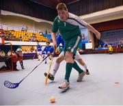 30 January 2013; Special Olympic athlete Aidan Cross, from Cahir, Co. Tipperary, on the attack for Team Ireland during the game. Match 2, Division 2, South Korea v Ireland, 2013 Special Olympics World Winter Games, Floorball, Gangneung Indoor Sports Center, Gangneung, South Korea. Picture credit: Ray McManus / SPORTSFILE