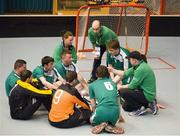 30 January 2013; The Team Ireland players including William McGrath, Roy Saville, Brendan O'Sullivan, George Fitzgerald, Sean Murphy, Joseph McCarthy, James Murphy, and Aidan Cross, hidden, and coaches Louise O’ Toole, and Martin O’ Leary, listen to Special Olympic Floorball Head Coach Paul O’ Callaghan before the game. Match 2, Division 2, South Korea v Ireland, 2013 Special Olympics World Winter Games, Floorball, Gangneung Indoor Sports Center, Gangneung, South Korea. Picture credit: Ray McManus / SPORTSFILE