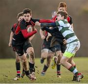 30 January 2013; Adam Curry, Wesley College, is tackled by Louis Shiels, St. Columba’s College. Fr. Godfrey Cup, Wesley College v St. Columba’s College, Templeogue College, Templeogue, Co. Dublin. Picture credit: Matt Browne / SPORTSFILE