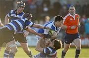 30 January 2013; Rory Parata, Rockwell College, is tackled by Eoin Casserly, left, and Joey Purcell, Crescent CC. Munster Schools Senior Cup, Quarter-Final, Round 1, Rockwell v Crescent CC, Clanwilliam, Limerick. Picture credit: Diarmuid Greene / SPORTSFILE