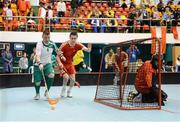 31 January 2013; Team Ireland's George Fitzgerald, from Waterford City, in action against Alaxander Hehle, Austria. Division 2, Semi-Final, Austria v Ireland, 2013 Special Olympics World Winter Games, Floorball, Gangneung Indoor Sports Center, Gangneung, South Korea. Picture credit: Ray McManus / SPORTSFILE
