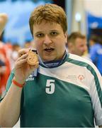 31 January 2013; Team Ireland's James Murphy, from Corbally, Co. Clare, celebrates after the Bronze Medal presentaion ceremony. Ireland beat the host nation, South Korea, in the 3rd / 4th place play off. 2013 Special Olympics World Winter Games, Floorball, Gangneung Indoor Sports Center, Gangneung, South Korea. Picture credit: Ray McManus / SPORTSFILE