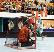 31 January 2013; Team Ireland's George Fitzgerald, from Waterford City, watches his shot hit the back of the Austria net for the first goal of the game. Division 2, Semi-Final, Austria v Ireland, 2013 Special Olympics World Winter Games, Floorball, Gangneung Indoor Sports Center, Gangneung, South Korea. Picture credit: Ray McManus / SPORTSFILE