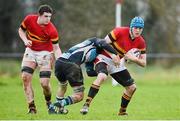 31 January 2013; Darragh Moloney, CBC, is tackled by Ronan Murphy, Castletroy College. Munster Schools Senior Cup Quarter-Final, Round 1, Castletroy College v CBC, Annacotty, Limerick. Picture credit: Diarmuid Greene / SPORTSFILE