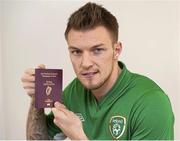 31 January 2013; Republic of Ireland and Norwich midfielder Anthony Pilkington pictured for the first time in an Irish jersey, along with his Irish passport, ahead of the Republic of Ireland's friendly against Poland next Wednesday in Aviva Stadium. For tickets or further information, please go to www.fai.ie. Colney Training Ground, Norwich, Norfolk, England. Picture credit: SPORTSFILE