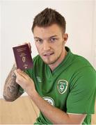 31 January 2013; Republic of Ireland and Norwich midfielder Anthony Pilkington pictured for the first time in an Irish jersey, along with his Irish passport, ahead of the Republic of Ireland's friendly against Poland next Wednesday in Aviva Stadium. For tickets or further information, please go to www.fai.ie. Colney Training Ground, Norwich, Norfolk, England. Picture credit: SPORTSFILE