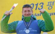2 February 2013; Team Ireland’s Ryan Hill, from Richhill, Co. Armagh, on the podium after he collected his silver medal in the intermediate grade super G. 2013 Special Olympics World Winter Games, Alpine skiing, Yongpyong Resort, PyeongChang, South Korea. Picture credit: Ray McManus / SPORTSFILE