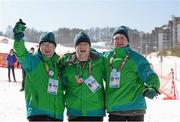 2 February 2013; Team Ireland’s Floorball bronze medal winners Sean Murphy, left, from Gurranabraher, Co Cork,  James Murphy, from Corbally, Co. Clare  and William McGrath, right, from Kilmacthomas, Co. Waterford relax as they support their Alpine Ski team mates. 2013 Special Olympics World Winter Games, Alpine skiing, Yongpyong Resort, PyeongChang, South Korea. Picture credit: Ray McManus / SPORTSFILE