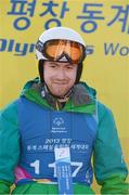 2 February 2013; Team Ireland’s Gary Burton, from Sallynoggin, Co. Dublin, on the rostrum after being placed fourth in the intermediate grade Super G. 2013 Special Olympics World Winter Games, Alpine skiing, Yongpyong Resort, PyeongChang, South Korea. Picture credit: Ray McManus / SPORTSFILE