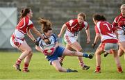 2 February 2013; Laura McEnaney, Monaghan, in action against Anne Walsh, Rena Buckley and Geraldine O'Flynn, Cork.  TESCO HomeGrown Ladies National Football League, Division 1, Round 1, Monaghan v Cork, Grattan Park, Inniskeen, Co. Monaghan. Picture credit: Oliver McVeigh / SPORTSFILE