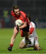 2 February 2013; Mark Poland, Down, in action against Joe McMahon, Tyrone. Allianz Football League, Division 1, Down v Tyrone, Pairc Esler, Newry, Co. Down. Picture credit: Oliver McVeigh / SPORTSFILE