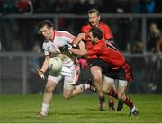 2 February 2013; Connor McAliskey, Tyrone, in action against Conor Laverty, Down. Allianz Football League, Division 1, Down v Tyrone, Pairc Esler, Newry, Co. Down. Picture credit: Oliver McVeigh / SPORTSFILE