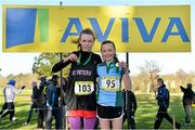 6 February 2013; Jodie McCann, right, Rathdown, Dublin, winner of the minor girls race on the podium with third place finisher Nicola Duffy, St.Peter's Dunboyne, Co. Meath, during the 2013 AVIVA Leinster Schools cross country championships. Santry Demesne, Santry, Co. Dublin. Picture credit: Barry Cregg / SPORTSFILE