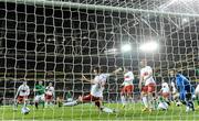 6 February 2013; Republic of Ireland's Ciaran Clark, left, shoots to score his side's first goal. International Friendly, Republic of Ireland v Poland, Aviva Stadium, Lansdowne Road, Dublin. Picture credit: David Maher / SPORTSFILE