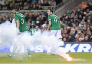 6 February 2013; A flare on the pitch during the game. International Friendly, Republic of Ireland v Poland, Aviva Stadium, Lansdowne Road, Dublin. Picture credit: Matt Browne / SPORTSFILE