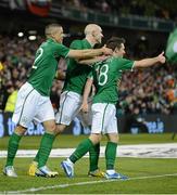 6 February 2013; Republic of Ireland's Wes Hoolahan, right, celebrates with team-mates Conor Sammon, centre, and Jon Walters after scoring his side's second goal. International Friendly, Republic of Ireland v Poland, Aviva Stadium, Lansdowne Road, Dublin. Picture credit: Brian Lawless / SPORTSFILE
