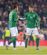 6 February 2013; Republic of Ireland players and Derby County team-mates Richard Keogh, left, and Jeff Hendrick shake hands after the game. International Friendly, Republic of Ireland v Poland, Aviva Stadium, Lansdowne Road, Dublin. Picture credit: Matt Browne / SPORTSFILE