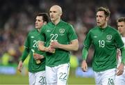 6 February 2013; Republic of Ireland players, from left to right, Greg Cunningham, Conor Sammon and Richard Keogh at the end of the game. International Friendly, Republic of Ireland v Poland, Aviva Stadium, Lansdowne Road, Dublin. Picture credit: David Maher / SPORTSFILE