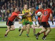 9 February 2013; Neil McGee, Donegal, in action against Mark Poland, Down. Allianz Football League, Division 1, Donegal v Down, Páirc MacCumhaill, Ballybofey, Donegal. Picture credit: Oliver McVeigh / SPORTSFILE