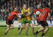 9 February 2013; Neil McGee, Donegal, in action against Mark Poland, Down. Allianz Football League, Division 1, Donegal v Down, Páirc MacCumhaill, Ballybofey, Donegal. Picture credit: Oliver McVeigh / SPORTSFILE