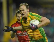 9 February 2013; Colm McFadden, Donegal, in action against Daniel McCartan, Down. Allianz Football League, Division 1, Donegal v Down, Páirc MacCumhaill, Ballybofey, Donegal. Picture credit: Oliver McVeigh / SPORTSFILE