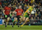 9 February 2013; Michael Murphy, Donegal, in action against Kevin McKernan and Paul McComiskey, Down. Allianz Football League, Division 1, Donegal v Down, Páirc MacCumhaill, Ballybofey, Donegal. Picture credit: Oliver McVeigh / SPORTSFILE