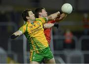9 February 2013; Michael Murphy, Donegal, in action against Peter Turley, Down. Allianz Football League, Division 1, Donegal v Down, Páirc MacCumhaill, Ballybofey, Donegal. Picture credit: Oliver McVeigh / SPORTSFILE