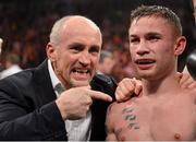 9 February 2013; Barry McGuigan, left, celebrates with Carl Frampton, Belfast, after knocking out Kiko Martinez, Spain, during their European Super Bantamweight Championship and IBF Inter-Continental Super Bantamweight contest. Betfair's Unfinished Business Fight Night, Odyssey Arena, Belfast, Co. Antrim. Photo by Sportsfile