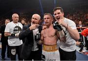 9 February 2013; Carl Frampton, Belfast, celebrates after knocking out Kiko Martinez, Spain, with manager Barry McGuigan, left, and Shane McGuigan, to win the European Super Bantamweight Championship and IBF Inter-Continental Super Bantamweight contest. Betfair's Unfinished Business Fight Night, Odyssey Arena, Belfast, Co. Antrim. Photo by Sportsfile