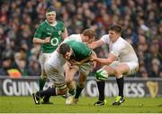 10 February 2013; Jonathan Sexton, Ireland, is disposessed by Chris Robshaw, left, and Owen Farrell, England. RBS Six Nations Rugby Championship, Ireland v England, Aviva Stadium, Lansdowne Road, Dublin. Picture credit: Brendan Moran / SPORTSFILE