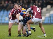 10 February 2013; Donal McElligott, Longford, in action against Ronan Foley and James Dolan, Westmeath. Allianz Football League, Division 2, Longford v Westmeath, Pearse Park, Longford. Picture credit: Oliver McVeigh / SPORTSFILE