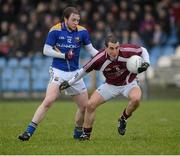 10 February 2013; Michael Curley, Westmeath, in action against Padraig Mc Cormack, Longford. Allianz Football League, Division 2, Longford v Westmeath, Pearse Park, Longford. Picture credit: Oliver McVeigh / SPORTSFILE