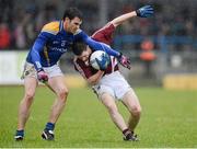 10 February 2013; Ronan Foley, Westmeath, in action against Bernard McElvanney, Longford. Allianz Football League, Division 2, Longford v Westmeath, Pearse Park, Longford. Picture credit: Oliver McVeigh / SPORTSFILE