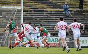 10 February 2013; Tyrone's Mark Donnelly is fouled late in the game resulting in a penalty, scored by Tyrone's Stephen O'Neill, to win the match. Allianz Football League, Division 1, Mayo v Tyrone, Elverys MacHale Park, Castlebar, Co. Mayo. Picture credit: Brian Lawless / SPORTSFILE