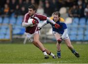 10 February 2013; Paul Sharry, Westmeath, in action against Padraig Mc Cormack, Longford. Allianz Football League, Division 2, Longford v Westmeath, Pearse Park, Longford. Picture credit: Oliver McVeigh / SPORTSFILE