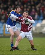 10 February 2013; Michael Curley, Westmeath, in action against Padraig Mc Cormack, Longford. Allianz Football League, Division 2, Longford v Westmeath, Pearse Park, Longford. Picture credit: Oliver McVeigh / SPORTSFILE