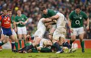 10 February 2013; Donnacha Ryan, Ireland, is tackled by Joe Marler, left, and James Haskell, England. RBS Six Nations Rugby Championship, Ireland v England, Aviva Stadium, Lansdowne Road, Dublin. Picture credit: Stephen McCarthy / SPORTSFILE