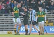 10 February 2013; Referee David Coldrick speaks to Kieran Donaghy, Kerry, before showing him a yellow card as Michael Darragh McAuley, Dublin, leaves the pitch after being sent off. Allianz Football League, Division 1, Kerry v Dublin, Fitzgerald Stadium, Killarney, Co. Kerry. Picture credit: Diarmuid Greene / SPORTSFILE