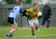 10 February 2013; Geraldine McLoughlin, Donegal, in action against Rachel Byrne, Dublin. TESCO HomeGrown Ladies National Football League, Division 1, Round 2, Chanel College, Coolock, Dublin. Picture credit: Pat Murphy / SPORTSFILE